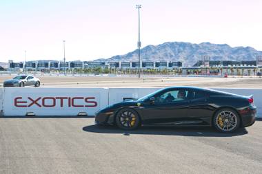 High performance sports cars make their way on and off the track through out the day at Exotics Racing Las Vegas, Thursday Oct. 25, 2012.